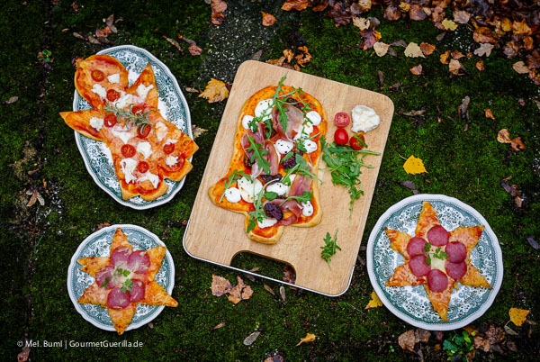 Christmas Pizza: Festive trilogy of salami stars, mozzarella angels and prosciutto fig bells